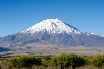 Fototapeta premium speak under a clear blue sky, copyspace on left. Soft natural light. International Mountain Day 