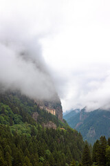 Sumela Monastery and misty mountains and forest covered hills