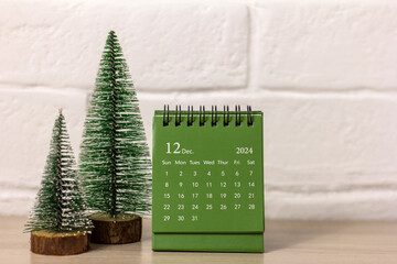 Hello, December 2024. Desk calendar for planning with copy space.