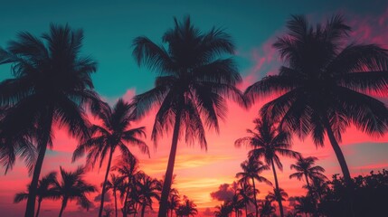 Silhouetted Palm Trees at Vibrant Tropical Sunset Beach
