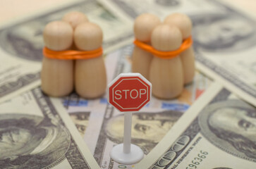 The stop sign serves as a warning, emphasizing the need to stop human trafficking and protect...