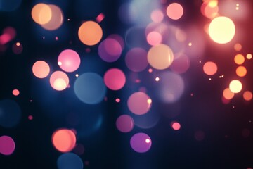 Fototapeta premium Close-up of colorful, glowing bokeh lights against a dark background, providing a festive or romantic atmosphere