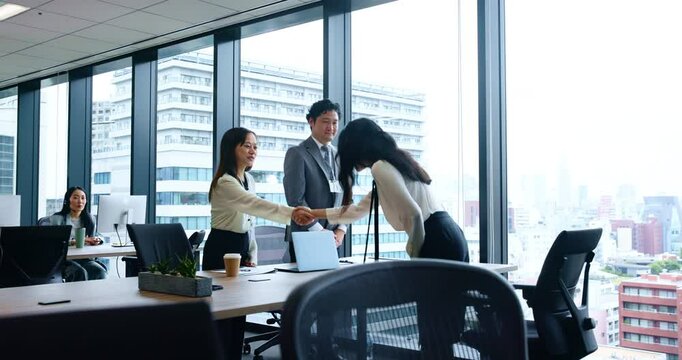 Japanese, business people and handshake with bow in job interview, meeting or contract negotiation. Women, man and welcome in office as hr manager, employer or consultant in company or human resource