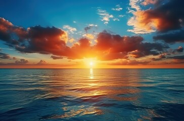 Obraz premium Vibrant Sunset Over Calm Ocean Waters Golden Clouds