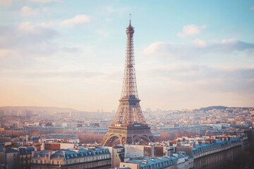 Fototapeta premium Iconic Tower Standing Tall Over City Skyline at Sunset