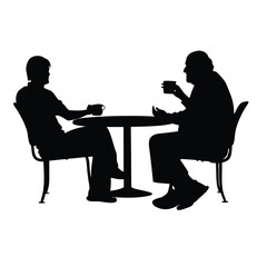 Two men sitting at a table. One man is drinking coffee. The other man is talking. There are two chairs