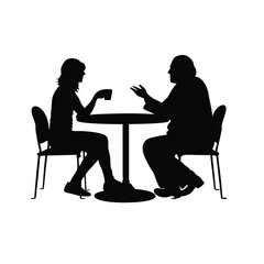 Two people sitting at a table. One of them is holding a cup. The table is round