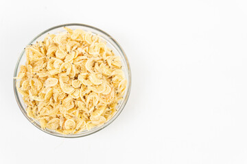 close up of Dried shrimp in a bowl on a white background, a popular ingredient in Asian cuisine. seasoning concept.