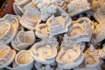 Detailed miniature replicas of St. Peter's Basilica displayed in souvenir shops as Vatican City...