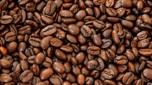 Close-up of roasted coffee beans. Roasted coffee robusta beans food concept