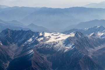 Mountains views from airplane (Islamabad to Skardu) in Pakistan. Beautiful view of snow capped mountains.