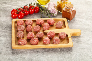 Uncooked raw beef meatball minced