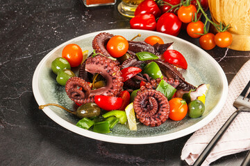 Salad with octopus tentacle and vegetables