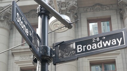 Broadway street road sign, Manhattan downtown financial district architecture, New York City corner. Traffic signage. Canyon of Heroes.