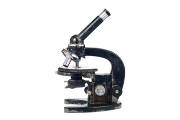 An old black metal microscope with manual settings, mounted on a white background.