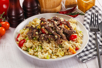 Traditional couscous with beef and vegetables