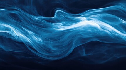 Fototapeta premium Misty blue smoke swirling on a dark backdrop creating an ethereal fog effect with dynamic motion, highlighting fluidity and depth amidst a mystic atmosphere, abstract art.