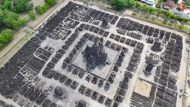 Aerial of Sewu Hindu Unesco site in Indonesia. Ruins after earthquake and mandala patterns.