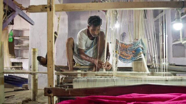 A skilled Indian artisan weaving on a traditional handloom, creating intricate patterns for a Banarasi silk saree in a rustic workshop. Captures the essence of traditional craftsmanship.