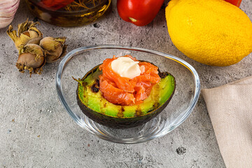 Whole grilled avocado with salmon