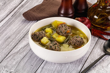 Soup with beef meatballs and vegetables