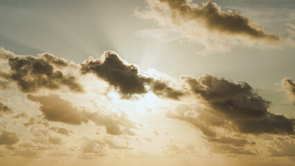 photo of the sun covered by clouds in the afternoon