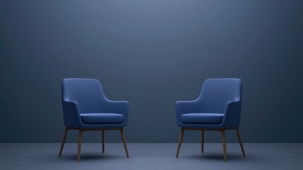 Fototapeta premium Two stylish blue chairs facing each other against a dark wall, creating a modern and inviting atmosphere.