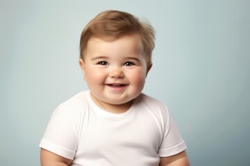 Naklejka premium Little chubby boy portrait smiling smile.