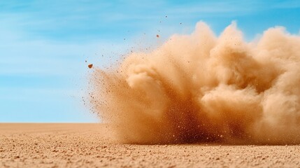 Dust clouds swirl as cars race through a sandy desert track during a thrilling off-road competition beneath a clear blue sky
