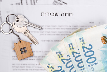 Rental or Residential Lease agreement, magnifying glass, Shekels money cash, and house keys. Short and long term rentals, housing searching crisis in Israel, signing contract, and rising prices.