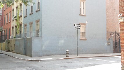 New York City oneway crossroad, Minetta street intersection one way arrow road sign. Manhattan...