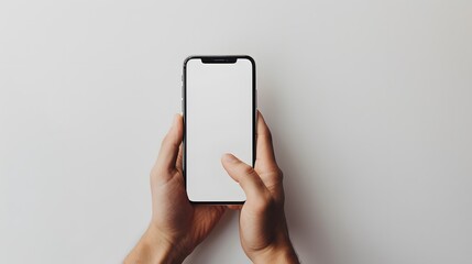 A man’s hand holds a smartphone. A phone is carried by a man in a white scene. A man’s hand and a clean design.