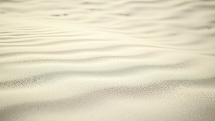 Obraz premium Soft, rippled beach sand with subtle texture and a gentle curve