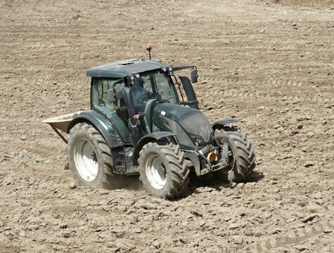 Valtra tractor working in the fields