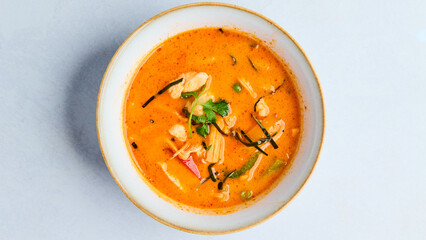 Gaeng Ped with Chicken – A flavorful Thai red curry made with tender chicken, aromatic herbs, coconut milk, and a blend of spices, offering a perfect balance of spicy, savory, and creamy flavors.