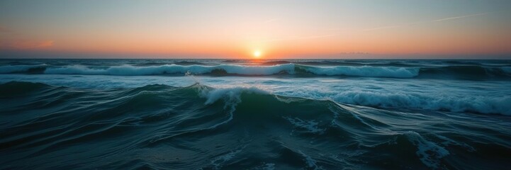 Sunrise over vast ocean with rolling waves creating a sense of movement and energy, foam, sunrise, calm
