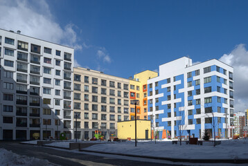 Fototapeta premium Modern Multi-Story Building with Colorful Exterior