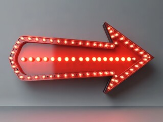 Obraz premium Red Neon Arrow Vintage Sign with Glowing Retro Cinema Design on Gray Gradient Background