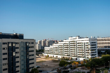 Residential buildings in Valdebebas with a blue sky. Madrid, Spain.