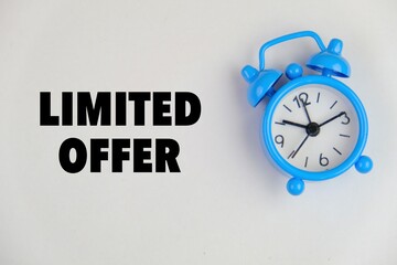 text of LIMITED OFFER on the white note paper as a business concept. 