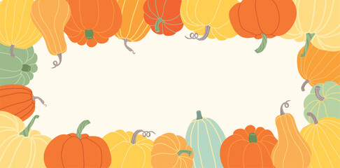 Frame of different types of pumpkins with space for text in the middle. Bright autumn template for Thanksgiving, Halloween, harvest season, invitations, advertisement, banner