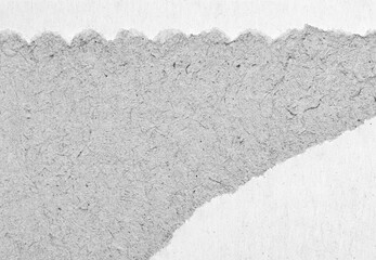 Torn gray white paper cardboard message background page with rough edges and blank copy space for...