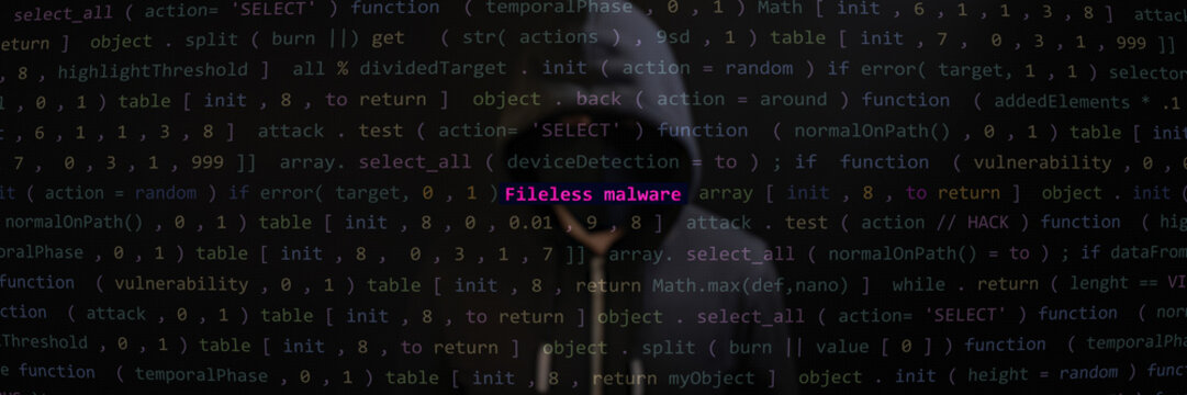 Cyber attack fileless malware text in foreground screen, Anonymous hacker hidden with hoodie in the blurred background. Vulnerability text in binary system ascii art style, code on editor screen. 