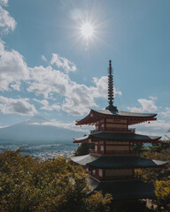 Fototapeta premium Mount Fuji viewed from Chureito Pagoda, a stunning blend of Japanese tradition, natural beauty, and iconic scenery.