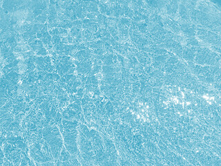 Clear water surface, ripple water in the sea with sun reflection