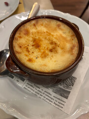 Moussaka Traditional Greek casserole layered with sautéed eggplant, spiced ground meat, and béchamel sauce.