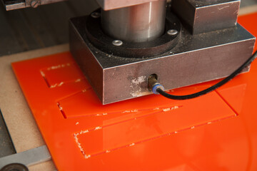 CNC milling machine for milling shapes and letters from metal or plastic.