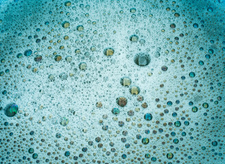 Soap bubbles on a blue background