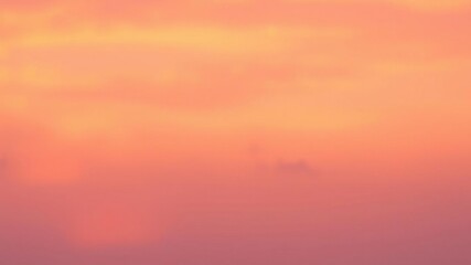 Obraz premium Gentle blend of oranges and purples creating an ethereal effect in a sunset sky with soft watercolor strokes, atmosphere, watercolor, sky