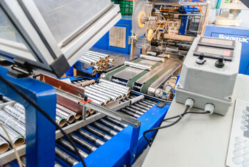 Machine for the cutting of thin aluminum foil into strips